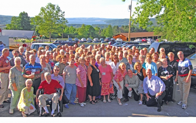 As good a photo as we could possibly get of all the class members who attended the reunion. Every person in this photo who brought a guest has exactly this same photo except they have phone lines in their photo.