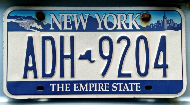 The webmaster takes photos of license plates to use as introductions to trips. Here is the one for the reunion trip. It is not from his car since he is from Ohio.